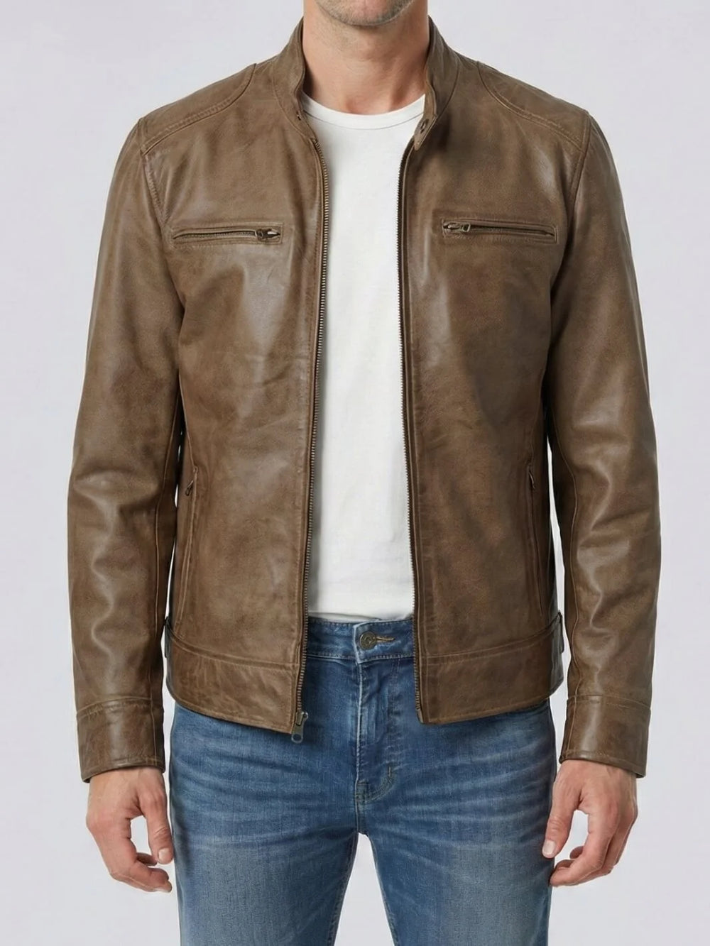Black leather jacket worn by a person on a light gray background